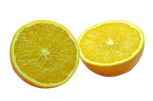 Cut in half an orange over a white background
