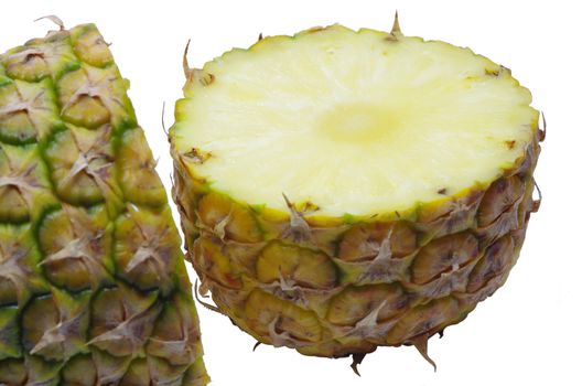 Pineapple fruit sliced on a white background