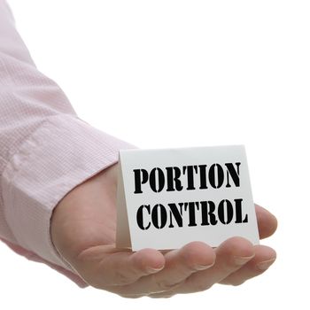 Business people holding portion control sign