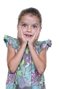 close-up portrait of a little amazing girl with blue eyes and opening mouth isolated on white