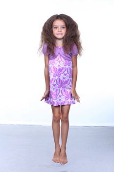 full-length portrait of a little girl in the studio