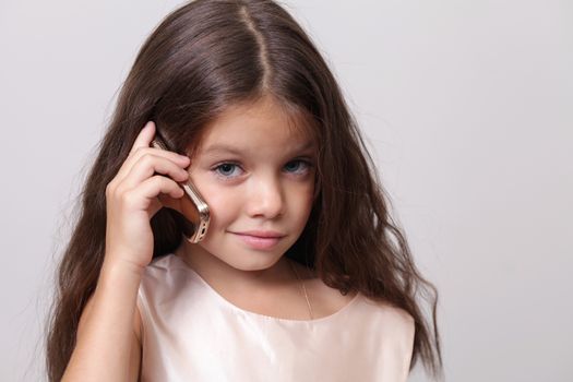 little girl calling by phone