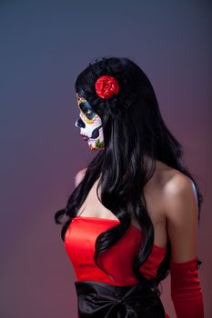 Profile shot of sugar skull girl, Day of the Dead, Halloween theme 