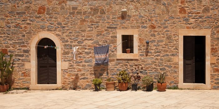 Panorama of inner court of monastery Toplou, Crete, Greece 