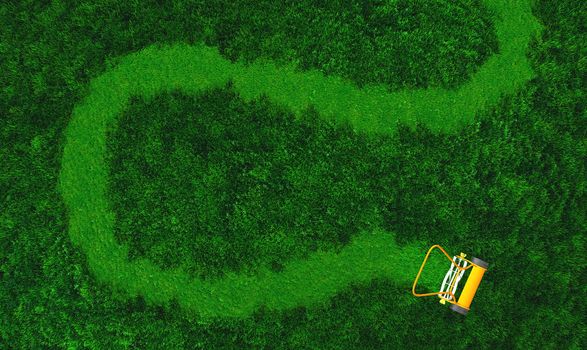 a top view of lawn where there is an orange push lawn mower in movement that is cutting the grass drawing a curved path on the grass