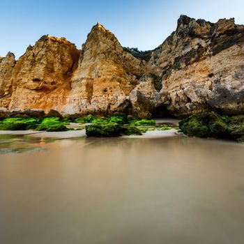 Green Stones at Porto de Mos Beach in Lagos, Algarve, Portugal