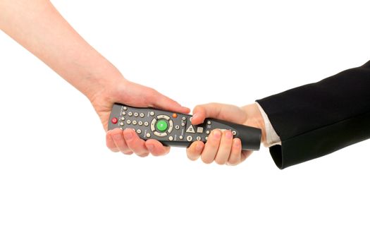 adult and boy hands struggle for remote control isolated
