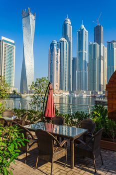 DUBAI, UAE - NOVEMBER 13: High rise buildings and streets nov 13. 2012  in Dubai, UAE. Dubai was the fastest developing city in the world between 2002 and 2008.