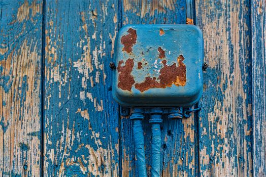 old electrical panel on the ancient wall