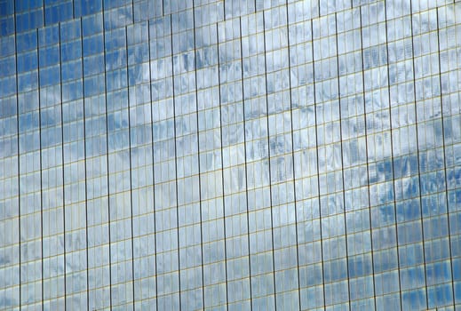 reflection of clouds on Corporate glass building