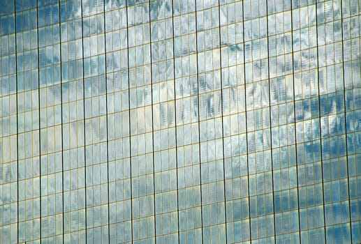 reflection of clouds on Corporate glass building