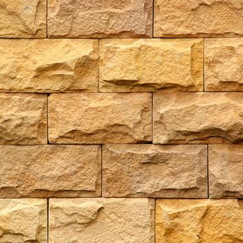 Brown stone brick wall with for background