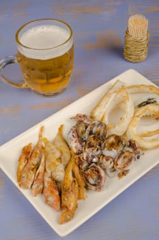 Freshly fried fish with a beer, an Andalusian tapa