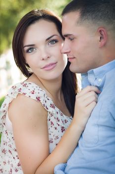 Happy Mixed Race Romantic Couple Portrait in the Park.