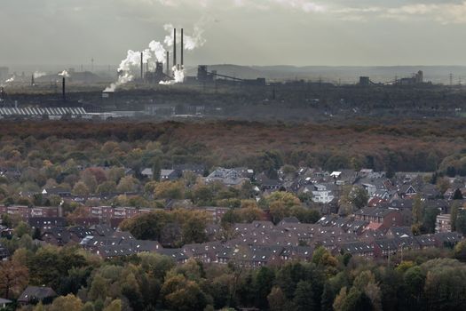 residential urban area of Oberhausen Germany Europe with heavy industry of the Ruhr Area Ruhrgebiet in background