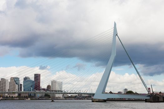 ROTTERDAM, NETHERLANDS - SEPTEMBER 28. Look Erasma Bridge to Rotterdam, Nideranda, September 28, 2012. Vantovy Bridge through the river Maas in the center of Rotterdam, the first from the sea.