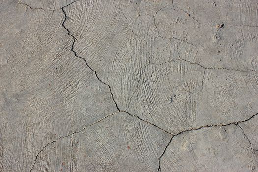 Grunge concrete cement wall with crack in industrial building