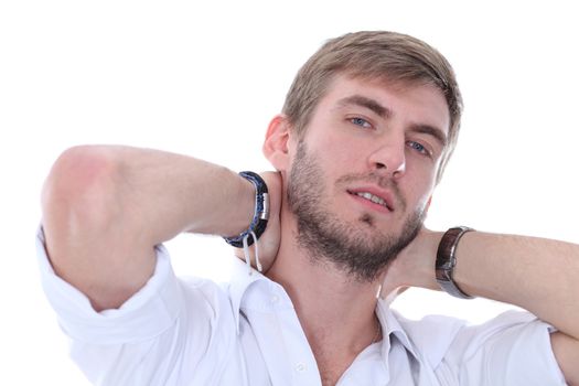 Portrait of a young man standing against white background