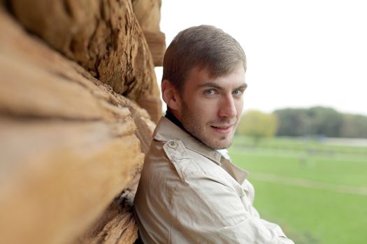 Portrait of young attractive man, outdoors