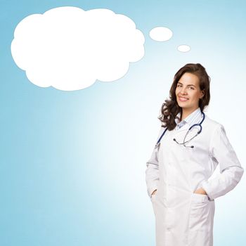 young woman doctor thinks cloud over his head, place for text