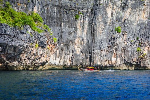 Boats at sea against the rocks in Thailand. Phi Phi Island