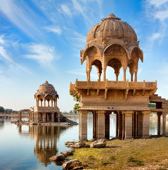 Gadi Sagar (Gadisar) Lake is one of the most important tourist attractions in Jaisalmer, Rajasthan, North India.   	
Artistically carved temples and shrines around The Lake Gadisar Jaisalmer.