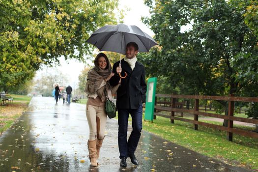 Portrait of love couple embracing outdoor