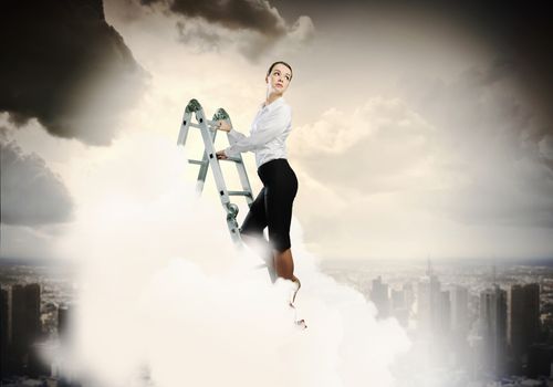 Image of young ambitious businesswoman climbing ladder. Promotion concept