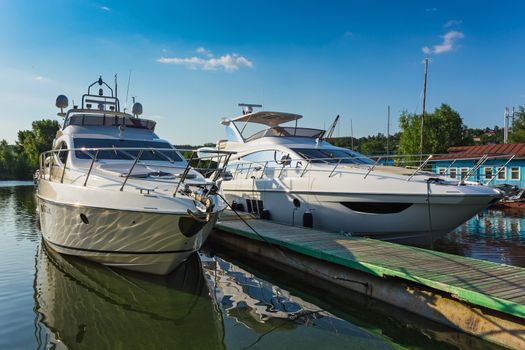 Luxury yachts at the dock in quiet haven