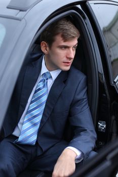 young attractive man young man in the car