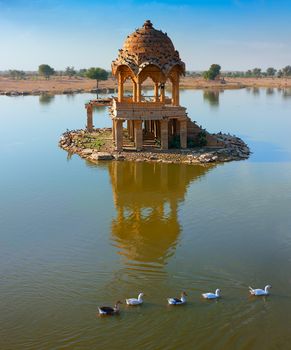 Gadi Sagar (Gadisar) Lake is one of the most important tourist attractions in Jaisalmer, Rajasthan, North India.  Artistically carved Chattris, Temples, Shrines and Ghats decorate of Gadi Sagar Lake. 