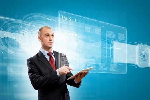 Image of businessman with tablet pc against media background