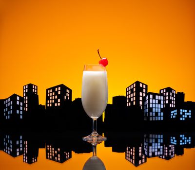 Metropolis Pina colada cocktail in city skyline setting