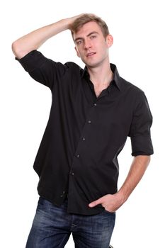 Portrait of a young man standing against white background