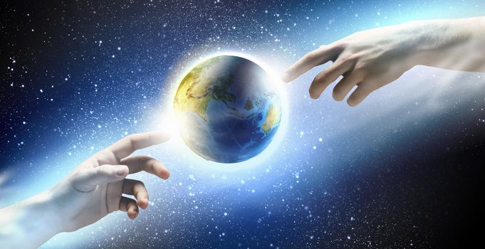 Close up of human hands touching with fingers. Based on Michelangelo picture. Elements of this image are furnished by NASA