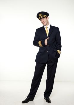 Portrait of a young man in the form of a passenger plane pilot