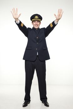 Portrait of a young man in the form of a passenger plane pilot