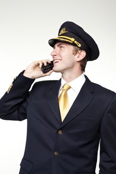 Portrait of a young man in the form of a passenger plane pilot