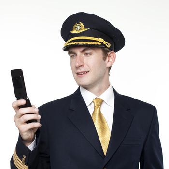 Portrait of a young man in the form of a passenger plane pilot