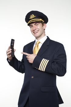 Portrait of a young man in the form of a passenger plane pilot