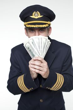 Portrait of a young man in the form of a passenger plane pilot