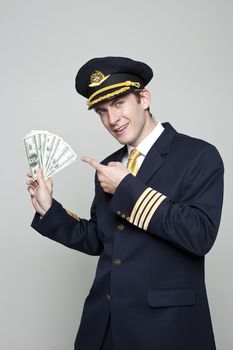 Portrait of a young man in the form of a passenger plane pilot