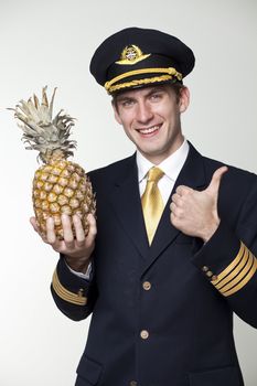 Portrait of a young man in the form of a passenger plane pilot