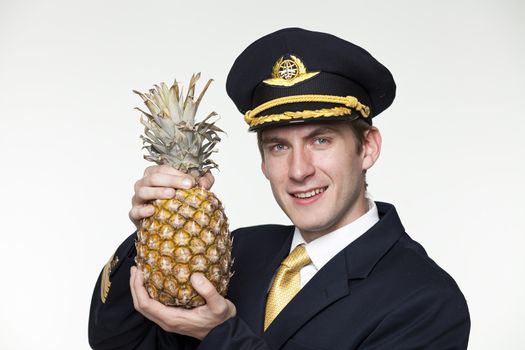 Portrait of a young man in the form of a passenger plane pilot