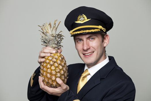 Portrait of a young man in the form of a passenger plane pilot