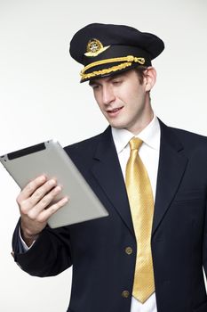 Portrait of a young man in the form of a passenger plane pilot