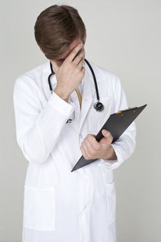 Studio portrait of a confident young doctor