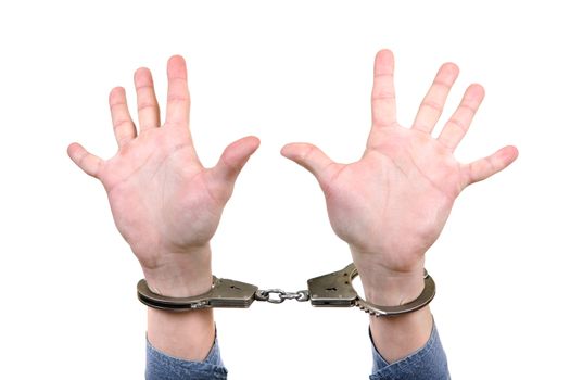 Handcuffs on Hands with wide apart fingers. Isolated on the White Background