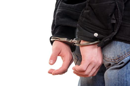 Rear view of the Man in Handcuffs on the White Background Closeup