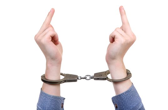 Handcuffs on Hands closeup with Middle Finger Gestutre Isolated on the White Background